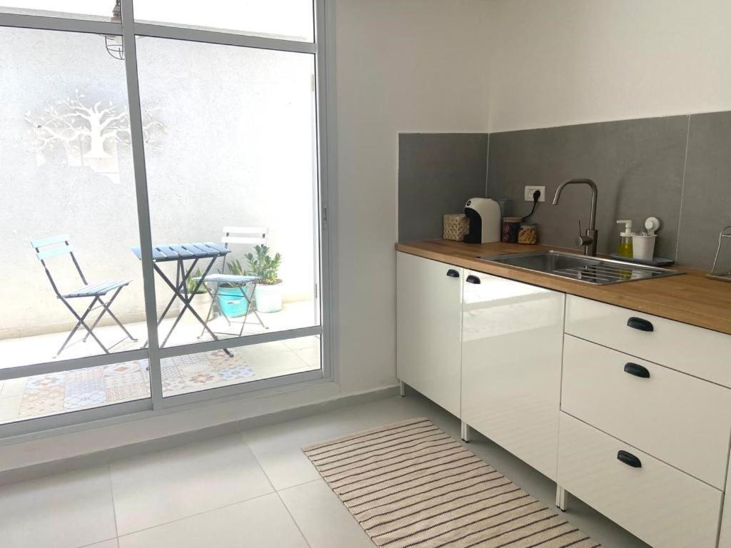 אירוח השקד - 10דק' משדה התעופה Appartement Giv'at Koach Buitenkant foto